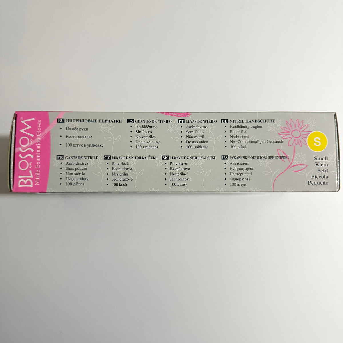 Blossom Pink Nitrile Powder-Free Examination Gloves packaging for dental and medical suppliers
