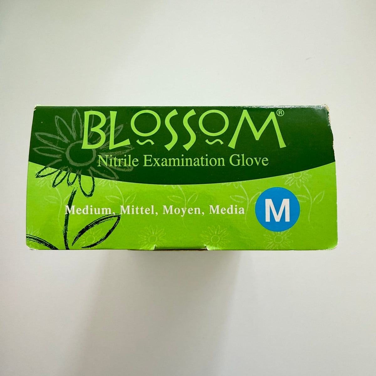 Blossom Green Tea Nitrile Exam Gloves for dentists and dental product wholesalers across Asia and the Middle East